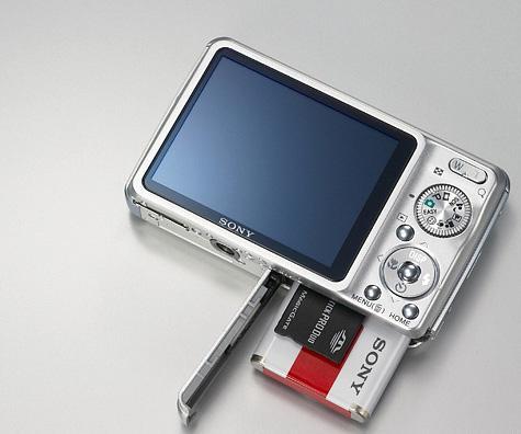 DSC-W210 Battery/ Memory Card Compartment