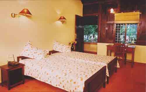 A bedroom in the pamba Heritage Villa 