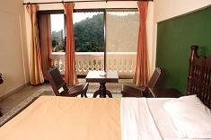 Bed Room in Greeshmam Resort