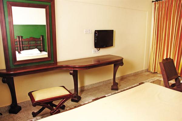 Bed Room in Greeshmam Resort