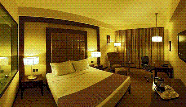 Bed room at Cambay Grand