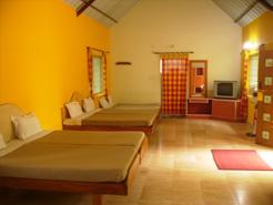 Room interiors of Parumpara Holiday Resort, Coorg